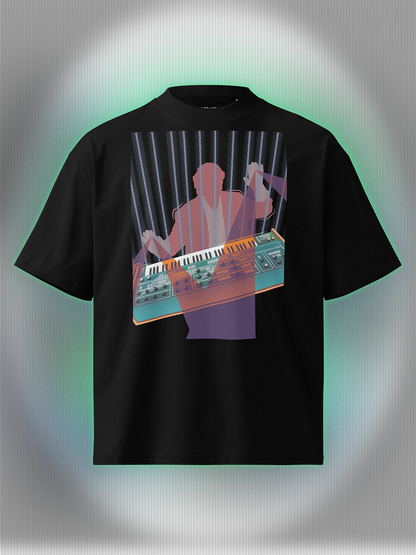 Black T-shirt with a colorful design of a man playing on a synthesizer and purple light beams go out of his hands.