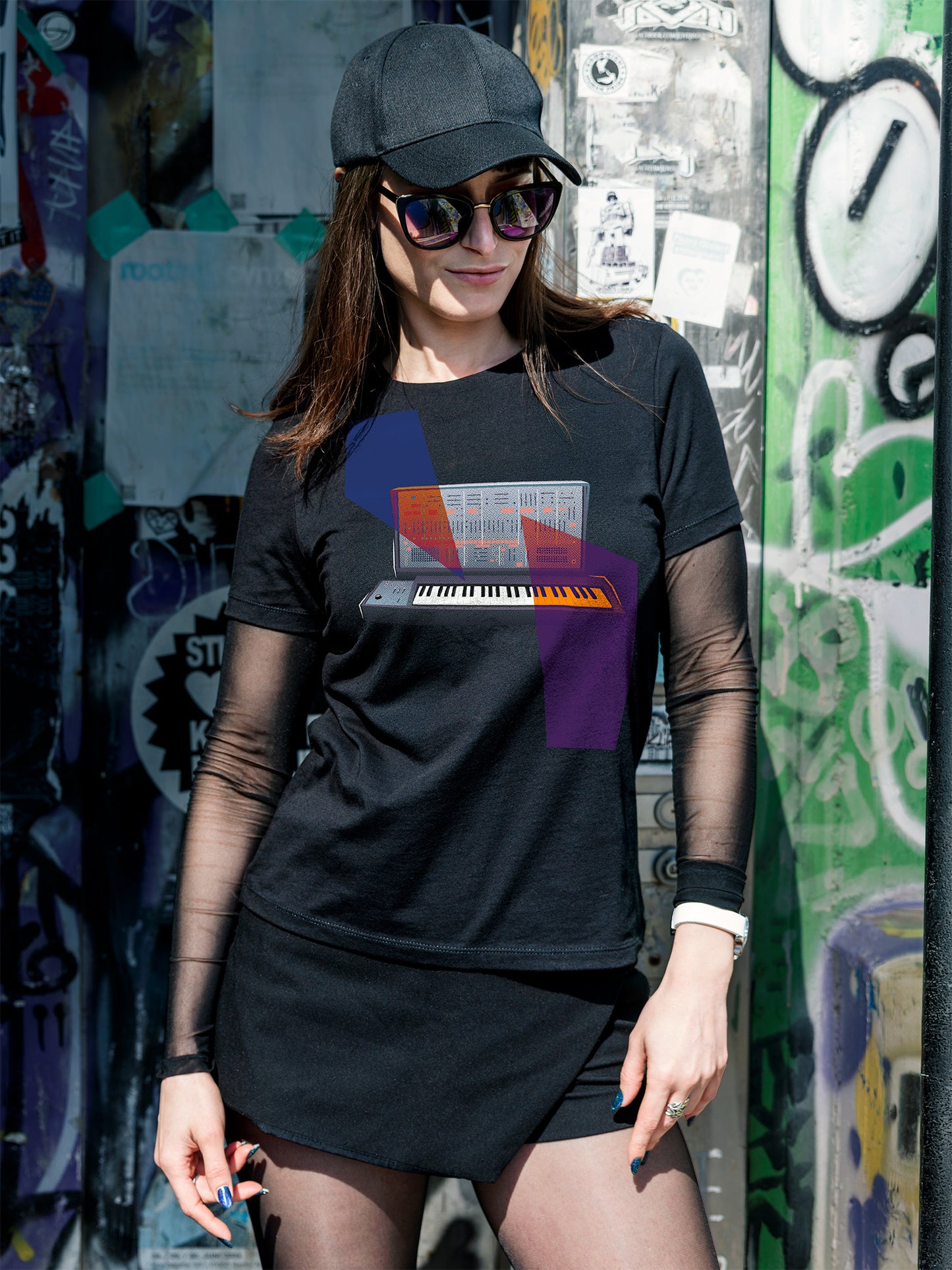 Black T-shirt with a graphic design of a keyboard with geometric colorful elements.