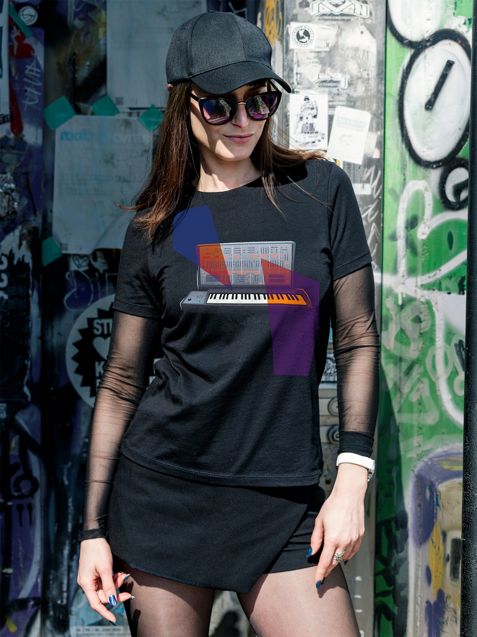 Black T-shirt with a graphic design of a keyboard with geometric colorful elements.
