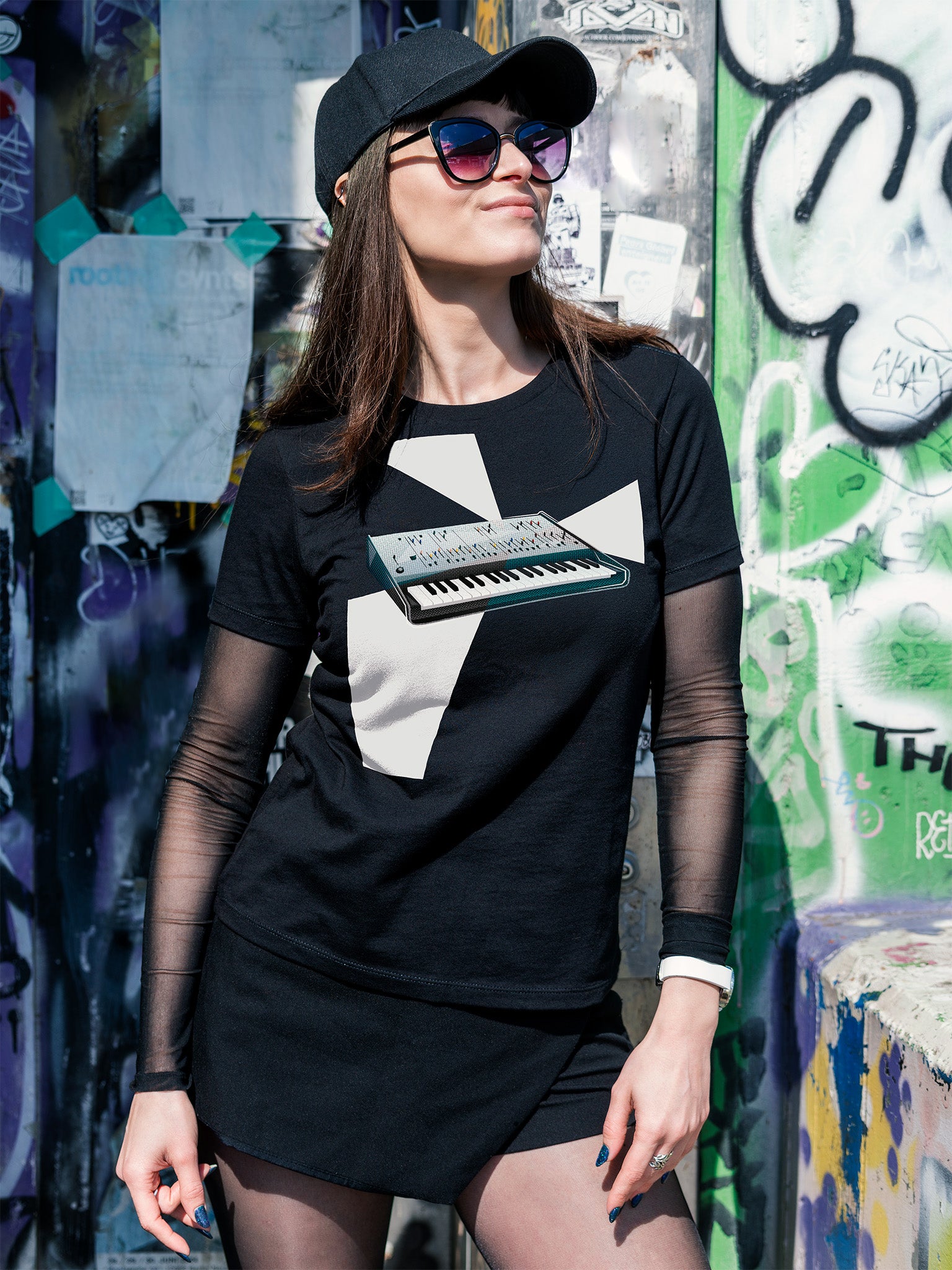 Black T-shirt with a graphic design of a keyboard with geometric colorful elements.