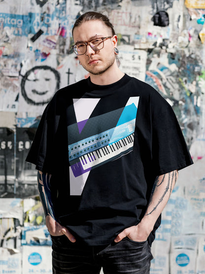 Black T-shirt with a graphic design of a colorful synthesizer with white and purple geometric colorful elements.